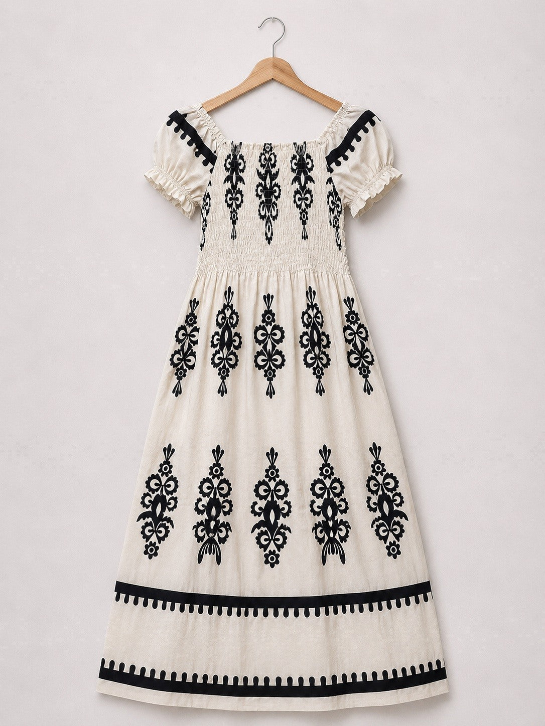 Robe midi smockée à imprimé